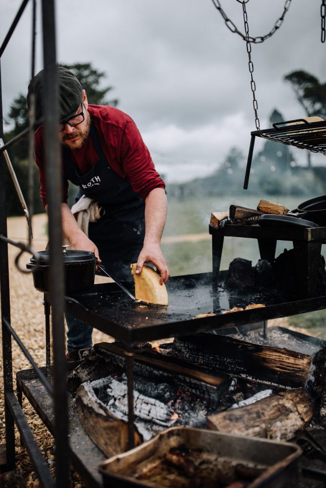 Man-Cooking-Fire